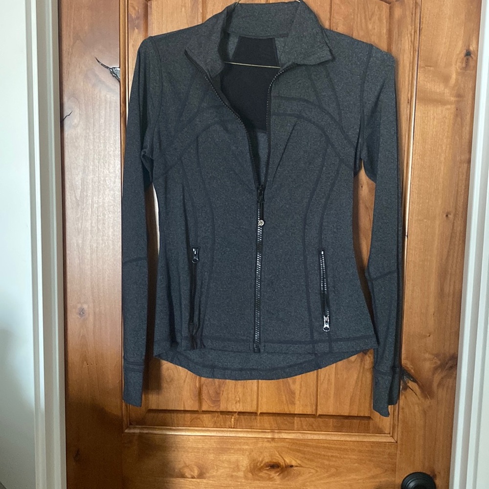 Fitted Lulu Lemon jacket. Charcoal grey. Like new.